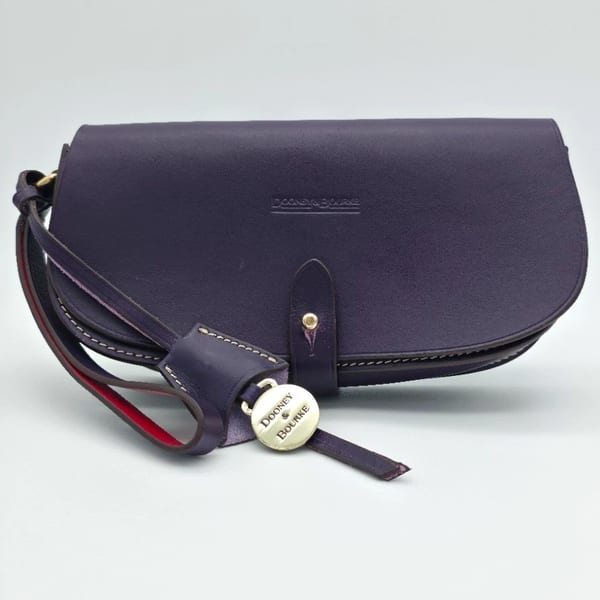 Dooney & Bourke Purple Leather Wristlet Red Lining Silver Hardware Charm